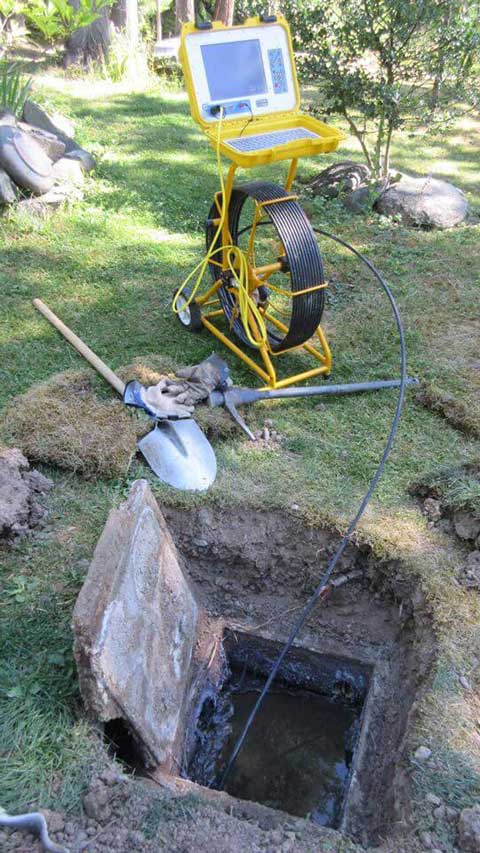 Inspecting-a-septic-tank